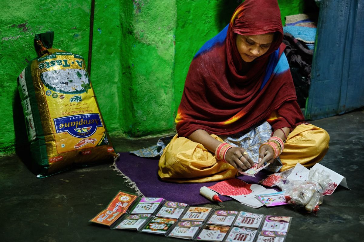 SEWA Delhi Home-Based Worker Making Handicrafts Woman home-based worker making handicraft products from her home in Delhi